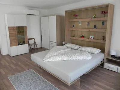 Ein Bett oder Betten in einem Zimmer der Unterkunft Schloss-Appartements