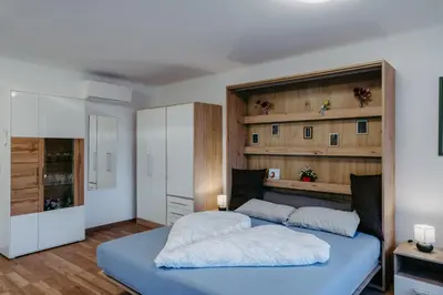Ein Bett oder Betten in einem Zimmer der Unterkunft Schloss-Appartements