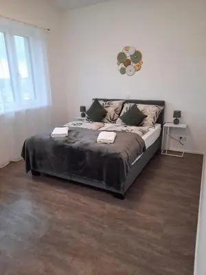 Ein Bett oder Betten in einem Zimmer der Unterkunft Ferienwohnungen Winzergasse