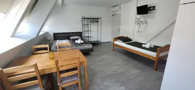 Ein Bett oder Betten in einem Zimmer der Unterkunft ToTa Studio