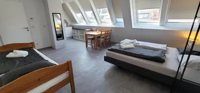 Ein Bett oder Betten in einem Zimmer der Unterkunft ToTa Studio