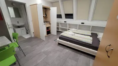 Ein Bett oder Betten in einem Zimmer der Unterkunft ToTa Studio