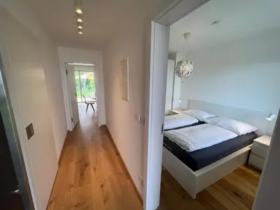 Ein Bett oder Betten in einem Zimmer der Unterkunft 25h SPA-Residenz BEST SLEEP privat Garden & POOLs