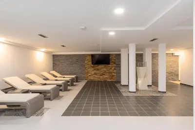 Ein Sitzbereich in der Unterkunft 25h SPA-Residenz BEST SLEEP privat Garden & POOLs