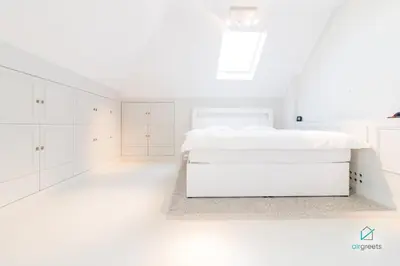 Ein Bett oder Betten in einem Zimmer der Unterkunft MODERN, MINIMALIST FLAT IN VIENNA