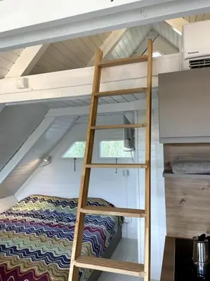 Ein Etagenbett oder Etagenbetten in einem Zimmer der Unterkunft Seehütte Neusiedlersee - Waterfront 2
