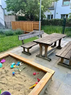 Ein Garten an der Unterkunft Dachgeschosswohnung mit kostenlosem Parkplatz und Internet!