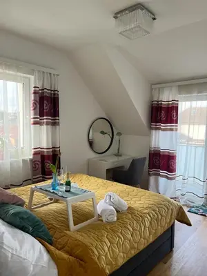 Ein Bett oder Betten in einem Zimmer der Unterkunft B-Apartment Vienna 12
