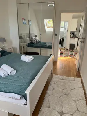 Ein Bett oder Betten in einem Zimmer der Unterkunft B-Apartment Vienna 12