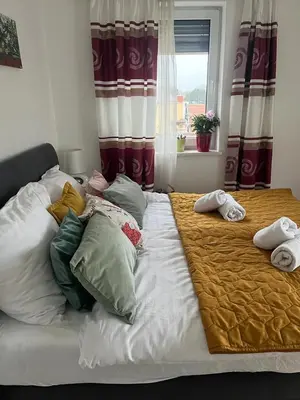 Ein Bett oder Betten in einem Zimmer der Unterkunft B-Apartment Vienna 12
