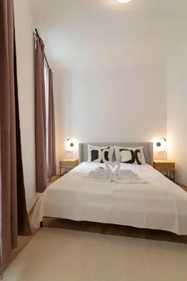 Ein Bett oder Betten in einem Zimmer der Unterkunft josef's home I Deluxe Apartment in Ideal Location