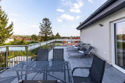 Ein Balkon oder eine Terrasse in der Unterkunft Wienerberg-Apartments