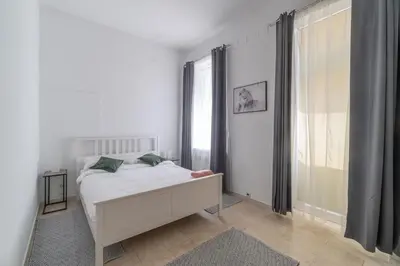 Ein Bett oder Betten in einem Zimmer der Unterkunft Centre Apartments