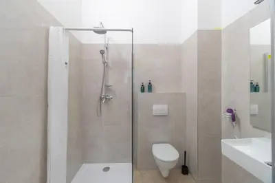 Ein Badezimmer in der Unterkunft Centre Apartments