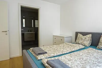Ein Bett oder Betten in einem Zimmer der Unterkunft Vienna City Apartments 1140 Vienna