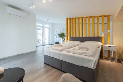Ein Bett oder Betten in einem Zimmer der Unterkunft Open Space with Free parking - Leopoldstadt