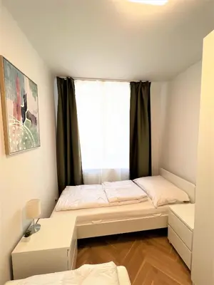 Ein Bett oder Betten in einem Zimmer der Unterkunft Unique Apartment Center Vienna