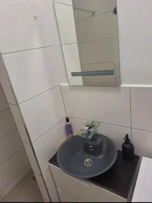 Ein Badezimmer in der Unterkunft Apartment RITHEL