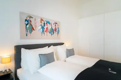 Ein Bett oder Betten in einem Zimmer der Unterkunft Vienna Residence, Marina Tower - Danube
