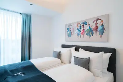 Ein Bett oder Betten in einem Zimmer der Unterkunft Vienna Residence, Marina Tower - Danube