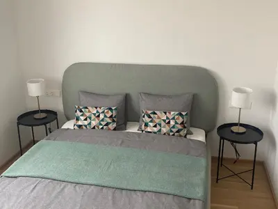 Ein Bett oder Betten in einem Zimmer der Unterkunft Urban Lifestyle