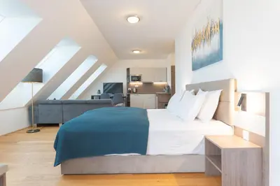 Ein Bett oder Betten in einem Zimmer der Unterkunft Hotel Triester
