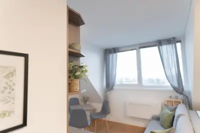 Ein Sitzbereich in der Unterkunft Hotel Triester