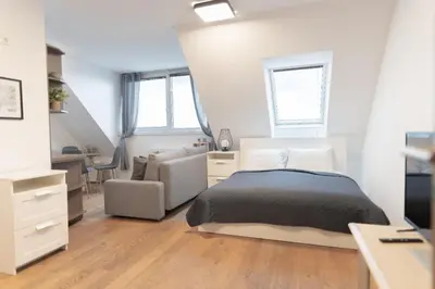Ein Bett oder Betten in einem Zimmer der Unterkunft Hotel Triester