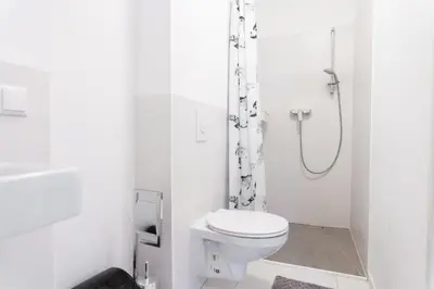 Ein Badezimmer in der Unterkunft Hotel Triester