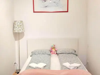 Ein Bett oder Betten in einem Zimmer der Unterkunft Central Mariahilfer Apartment 4 min to the city shopping center and Schönbrunn Palace
