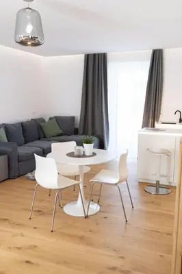 Ein Sitzbereich in der Unterkunft geislerAPPARTMENTS