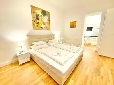 Ein Bett oder Betten in einem Zimmer der Unterkunft Steiner Residences Vienna Reumannplatz