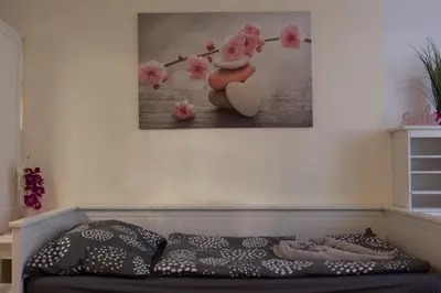Ein Bett oder Betten in einem Zimmer der Unterkunft Casa Lauda in Bad Vöslau