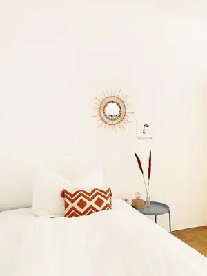 Ein Bett oder Betten in einem Zimmer der Unterkunft Sunny Apartment near Belvedere Castle