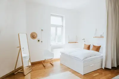 Ein Bett oder Betten in einem Zimmer der Unterkunft Central Design-Apartment next to Belvedere Castle
