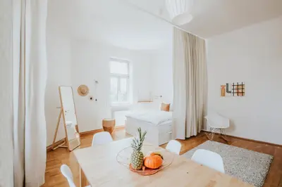 Ein Bett oder Betten in einem Zimmer der Unterkunft Central Design-Apartment next to Belvedere Castle