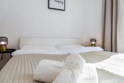 Ein Bett oder Betten in einem Zimmer der Unterkunft A&S Center Apartment Vienna