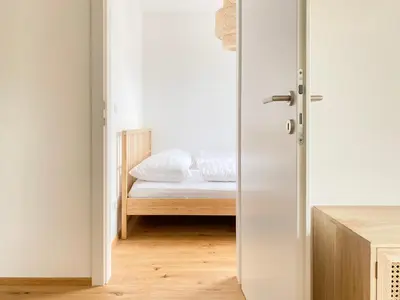 Ein Bett oder Betten in einem Zimmer der Unterkunft STAD10 - Apartments very close to subway U2 Stadlau