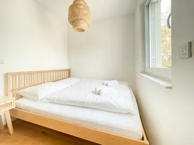 Ein Bett oder Betten in einem Zimmer der Unterkunft STAD10 - Apartments very close to subway U2 Stadlau