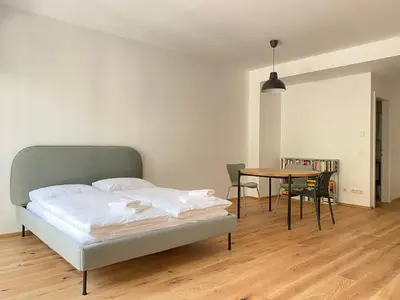 Ein Bett oder Betten in einem Zimmer der Unterkunft STAD10 - Apartments very close to subway U2 Stadlau