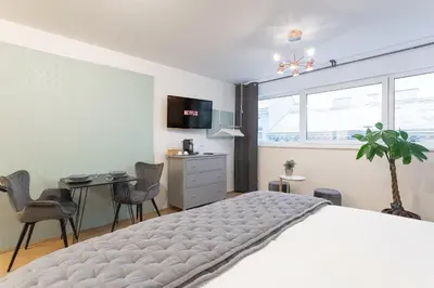 Ein Bett oder Betten in einem Zimmer der Unterkunft New Luxus Studio - 10min Centre - Markus apartment