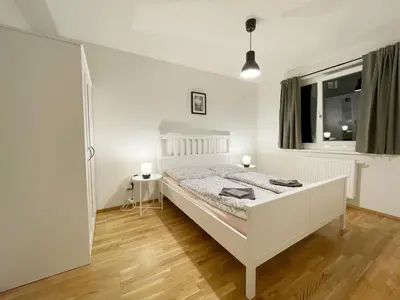 Ein Bett oder Betten in einem Zimmer der Unterkunft MUZETA11 - Modern Town Apartment with Balcony