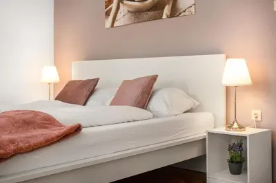 Ein Bett oder Betten in einem Zimmer der Unterkunft Comfy 3BR Stay Ideal Group Getaways & Families