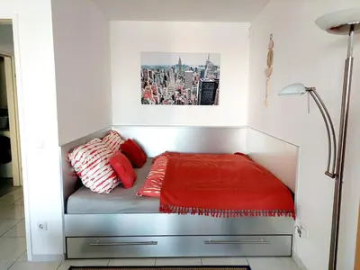 Ein Bett oder Betten in einem Zimmer der Unterkunft Tower Apartment with private terrace next to UNO
