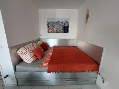 Ein Bett oder Betten in einem Zimmer der Unterkunft Tower Apartment with private terrace next to UNO