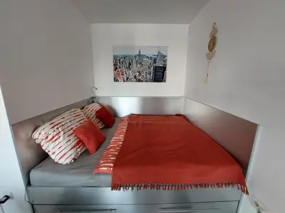 Ein Bett oder Betten in einem Zimmer der Unterkunft Tower Apartment with private terrace next to UNO
