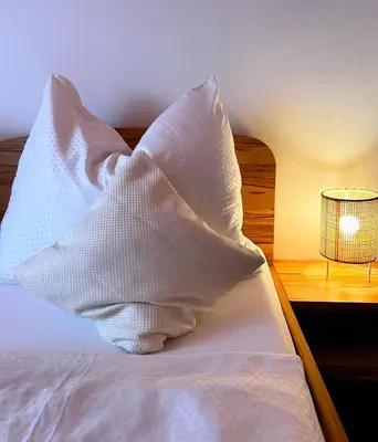 Ein Bett oder Betten in einem Zimmer der Unterkunft Frühstückspension Elena Nicoleta Caltun