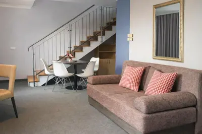 Ein Sitzbereich in der Unterkunft 24hours Apartment Hotel