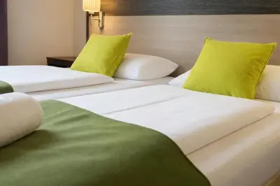 Ein Bett oder Betten in einem Zimmer der Unterkunft 24hours Apartment Hotel