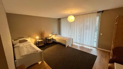 Ein Bett oder Betten in einem Zimmer der Unterkunft Nest Natur Hostel